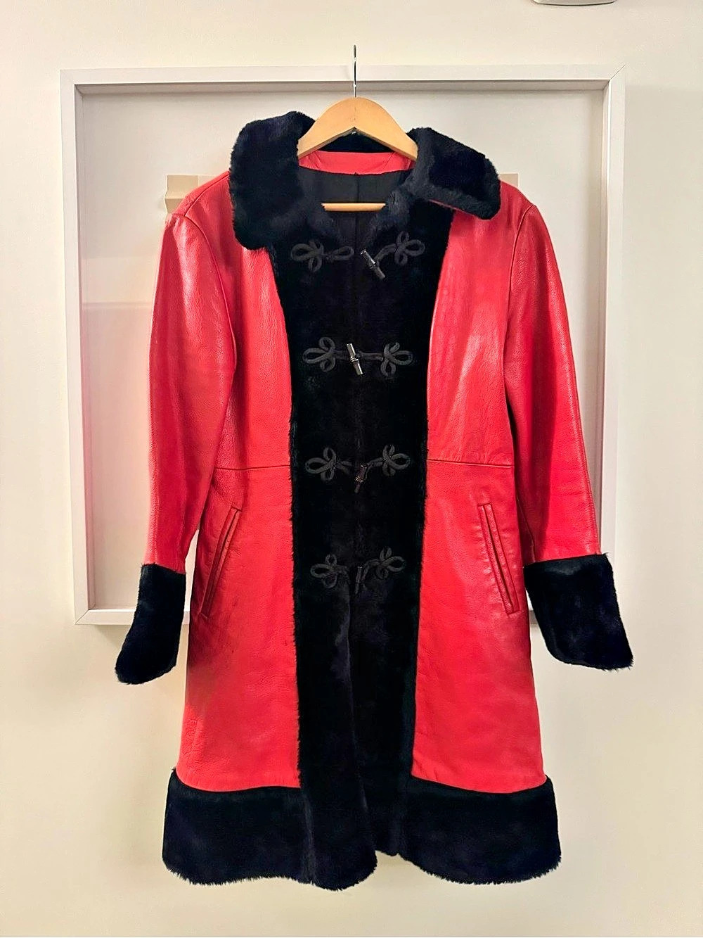 Vintage red leather coat with black faux fur trim
